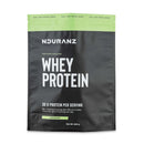 Nduranz Whey Protein – 820 g, Pistaziengeschmack, wiederverschließbare schwarz-grüne Verpackung mit Nährwertangaben auf weißem Hintergrund.